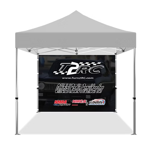 Gray outdoor canopy tent with branded banner featuring Turn2RC logo and text.